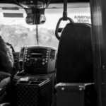 Chauffeur aan het werk met een bus van EBS, met informatie over solliciteren en loopbaanmogelijkheden.